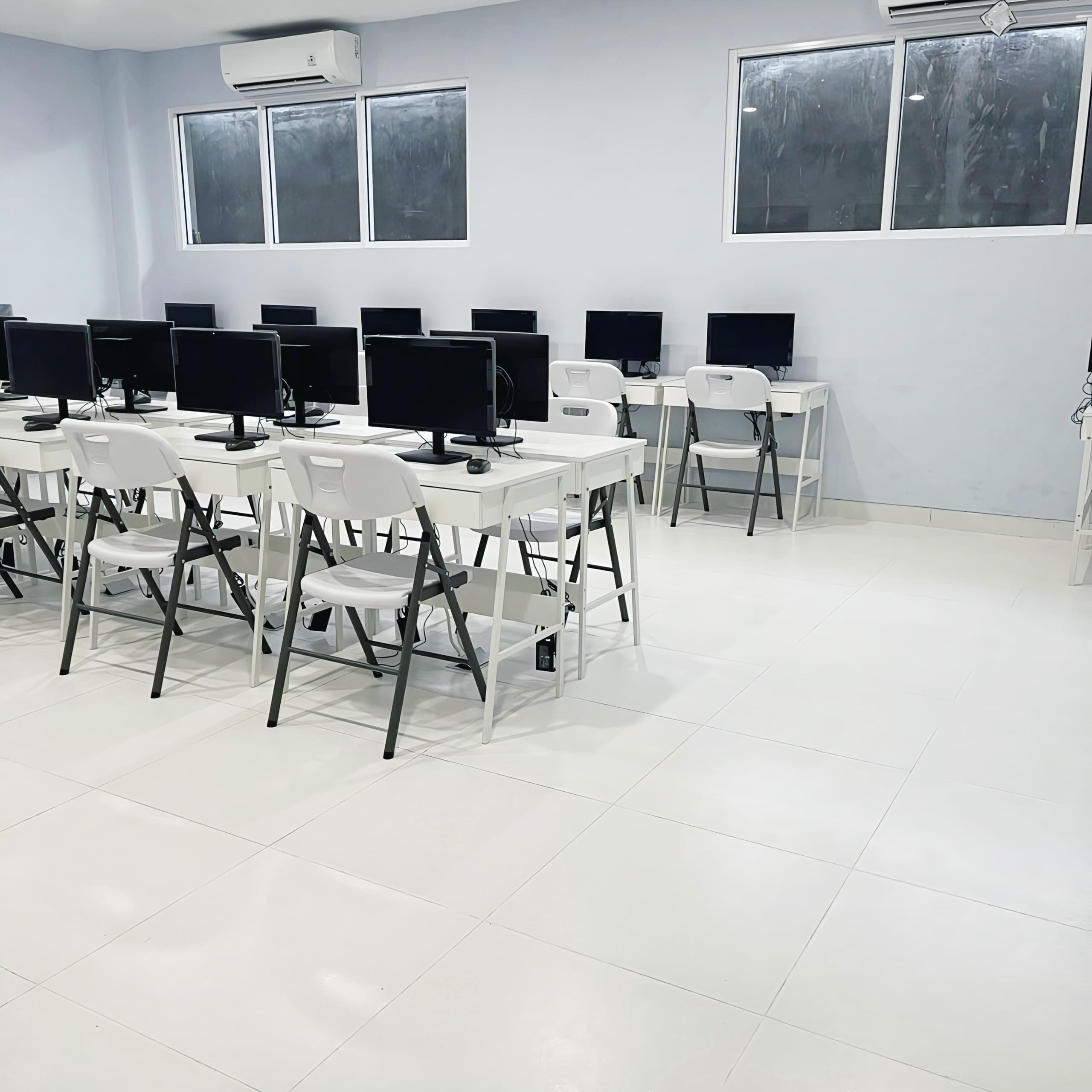 ICT computer lab with rows of desktop computers